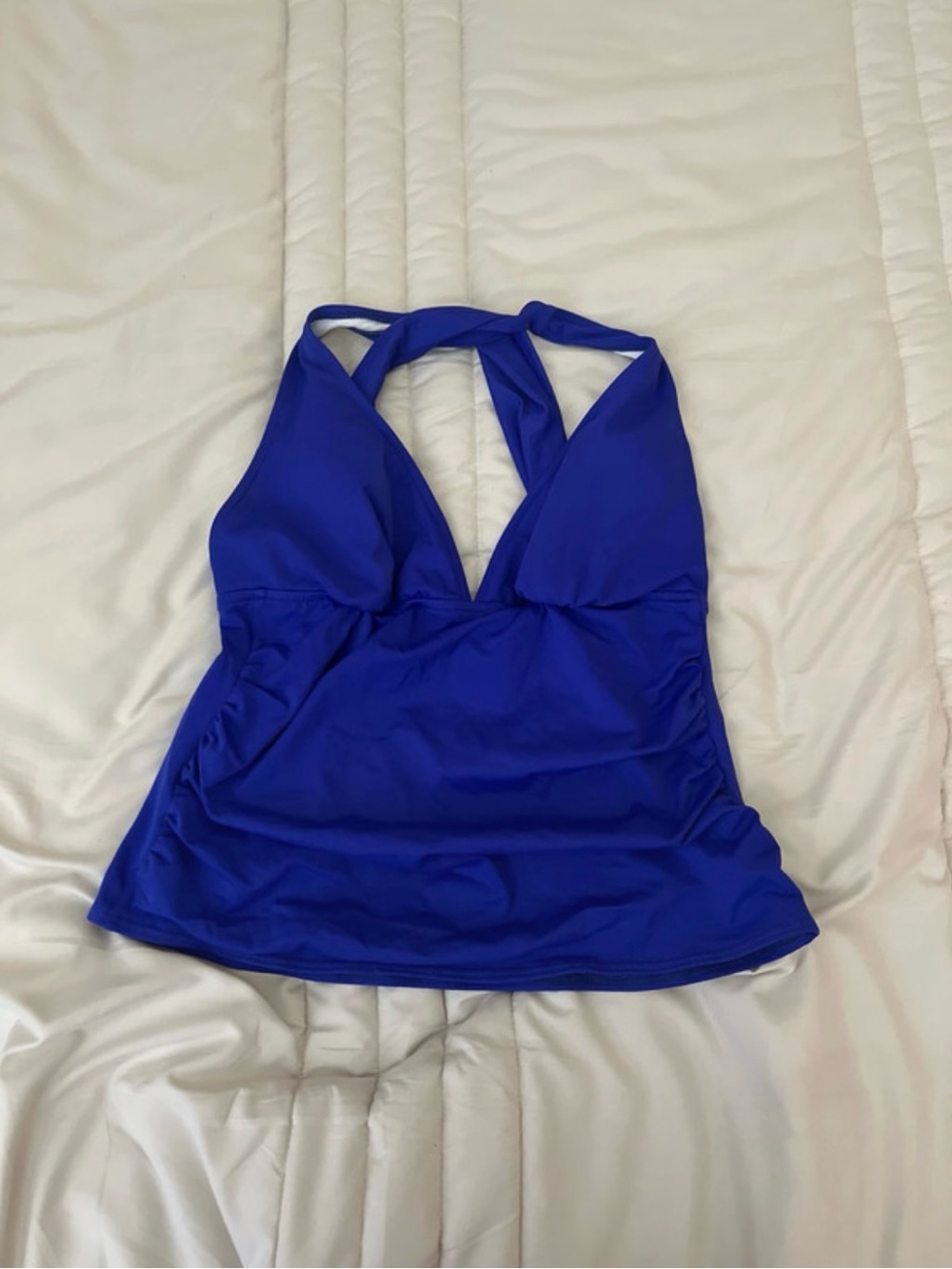 Woman’s blue tankini top